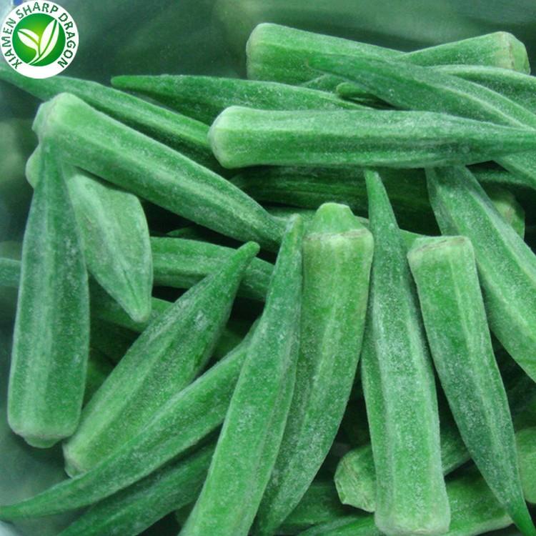 Whole frozen okra pods arranged loosely for size inspection