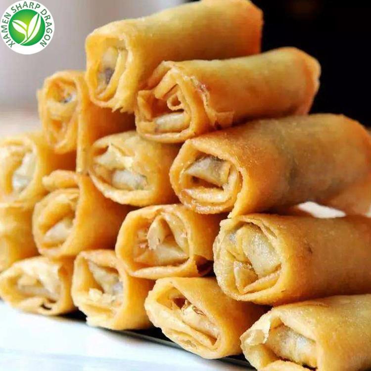 Cooked spring rolls stacked together
