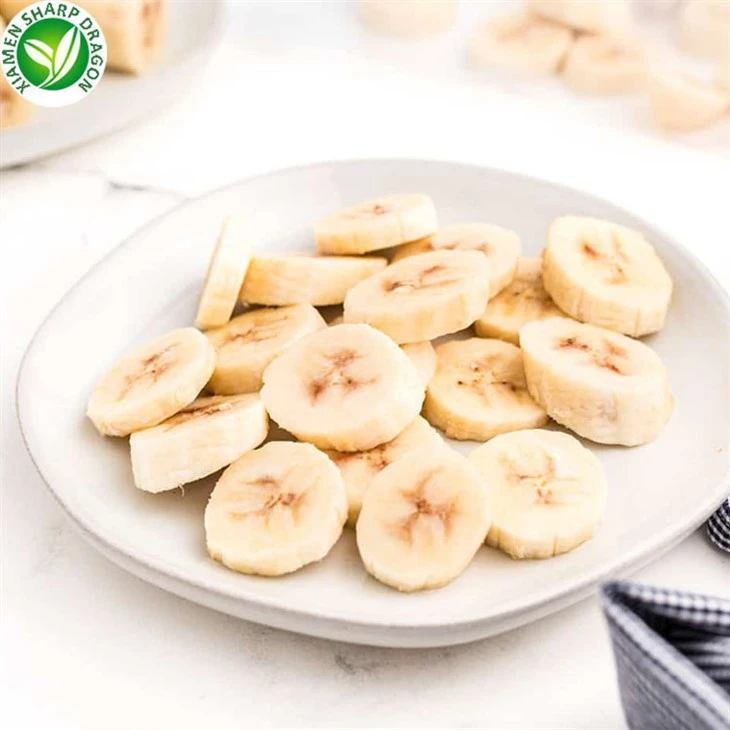 Banana slices as a portioned food ingredient Round banana pieces arranged on a plate for serving or recipe use