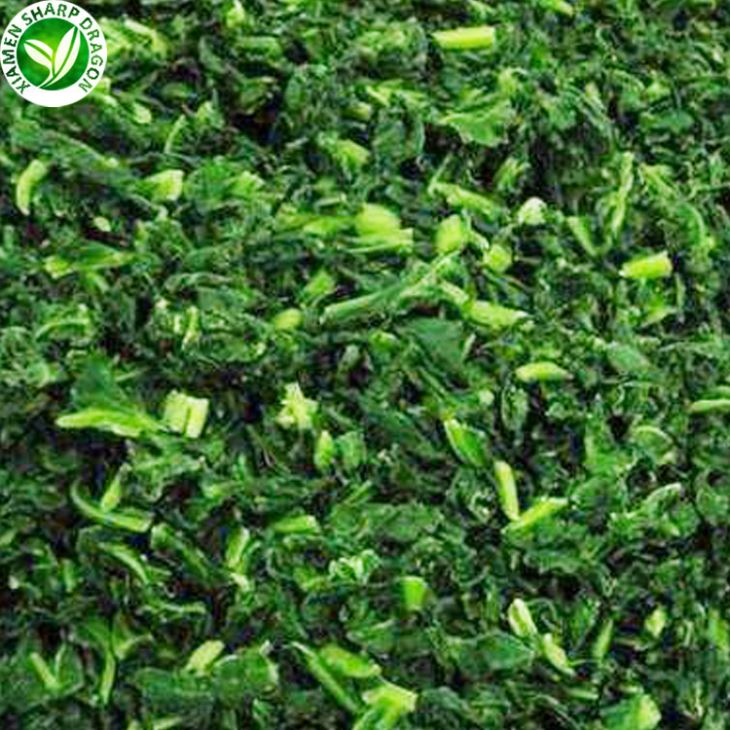 IQF chopped spinach showing leaf particle size and frozen separation
