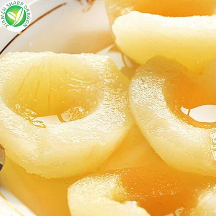 Pear halves packed in water