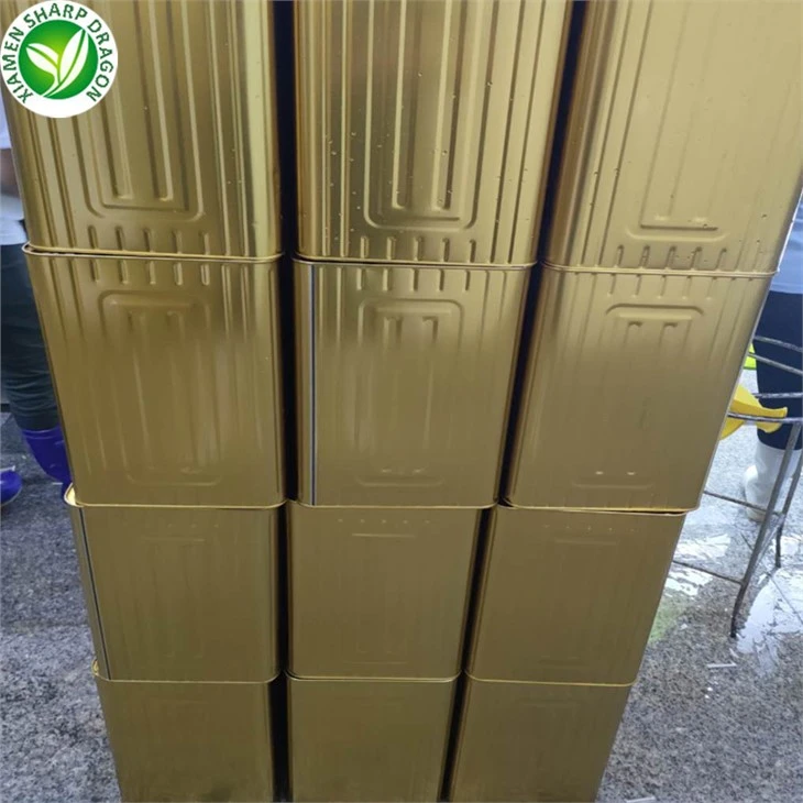 Rectangular metal containers stacked in rows
