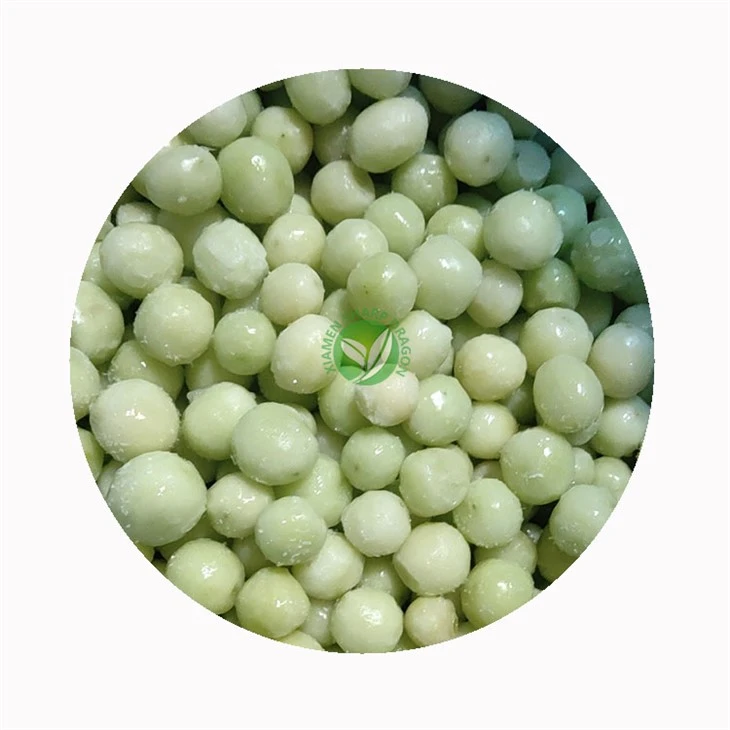 Frozen green grape presentation Loose green grapes with visible surface frost